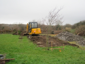 Digger at work - nice pile of topsoil! Digger at work - nice pile of topsoil!